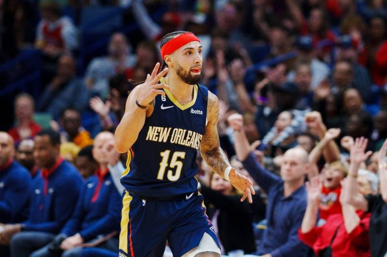 Dec 4, 2022; New Orleans, Louisiana, USA; New Orleans Pelicans guard Jose Alvarado (15) reacts to a three point shot during the second quarter against the Denver Nuggets at Smoothie King Center. Mandatory Credit: Andrew Wevers-USA TODAY Sports