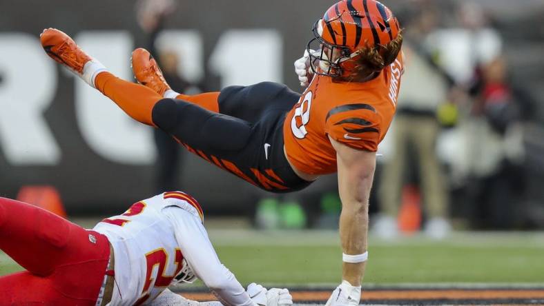 Dec 4, 2022; Cincinnati, Ohio, USA; Kansas City Chiefs safety Juan Thornhill (22) trips up Cincinnati Bengals tight end Hayden Hurst (88) in the first half at Paycor Stadium. Mandatory Credit: Katie Stratman-USA TODAY Sports