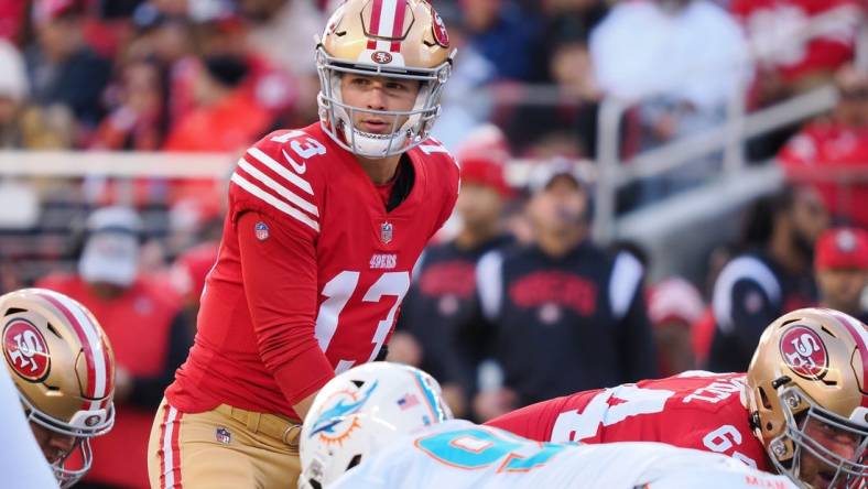 Dec 4, 2022; Santa Clara, California, USA; San Francisco 49ers quarterback Brock Purdy (13) prepares for the snap against the Miami Dolphins during the first quarter at Levi's Stadium. Mandatory Credit: Kelley L Cox-USA TODAY Sports