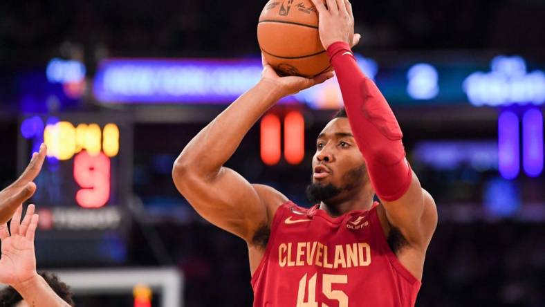 Dec 4, 2022; New York, New York, USA; Cleveland Cavaliers guard Donovan Mitchell (45) attempts a shot against the New York Knicks during the first quarter at Madison Square Garden. Mandatory Credit: Dennis Schneidler-USA TODAY Sports