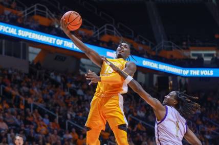 Dec 4, 2022; Knoxville, Tennessee, USA; Tennessee Volunteers guard Jahmai Mashack (15) goes to the basket against Alcorn State Braves forward Dontrell McQuarter (1) at Thompson-Boling Arena. Mandatory Credit: Randy Sartin-USA TODAY Sports