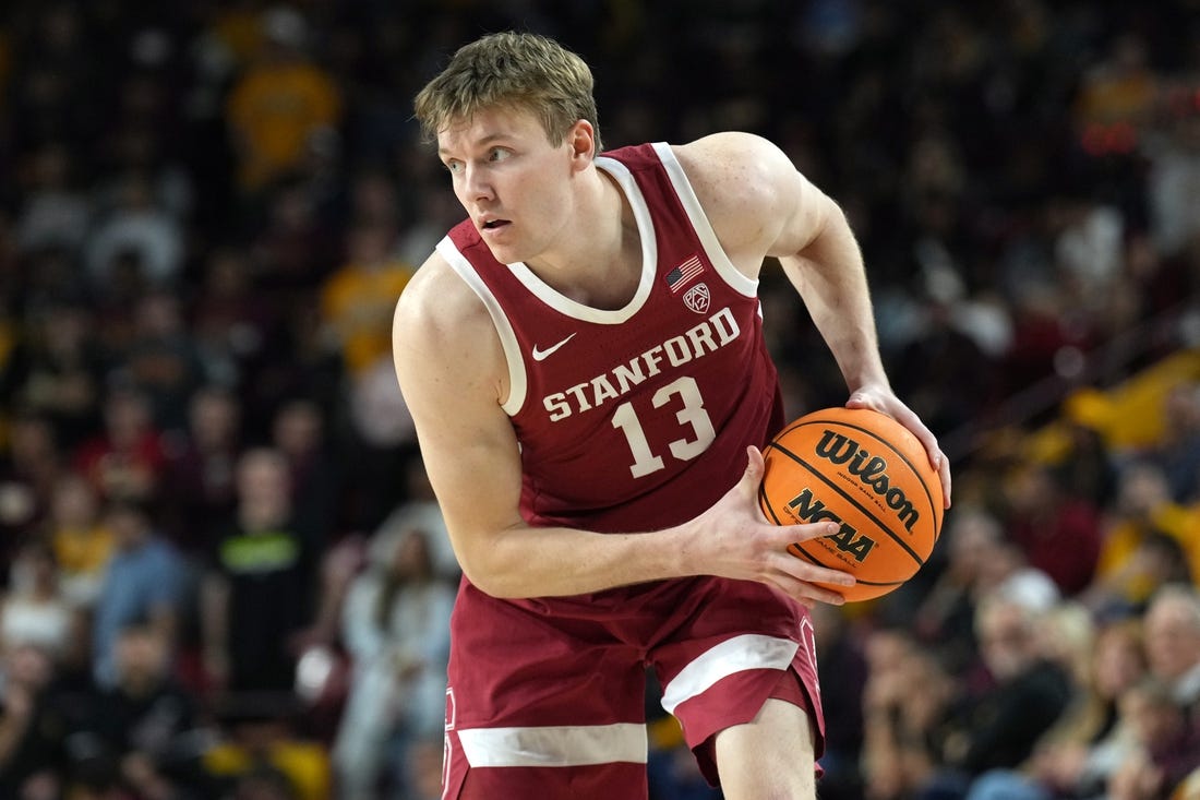 Dec 4, 2022; Tempe, Arizona, USA; Stanford Cardinal guard Michael Jones (13) controls the ball against the Arizona State Sun Devils during the first half at Desert Financial Arena. Mandatory Credit: Joe Camporeale-USA TODAY Sports