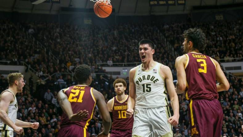 Purdue Boilermakers center Zach Edey (15) celebrates after scoring a dunk during the NCAA men   s basketball game against the Minnesota Gophers, Sunday, Dec. 4, 2022, at Mackey Arena in West Lafayette, Ind.

Np2 4604