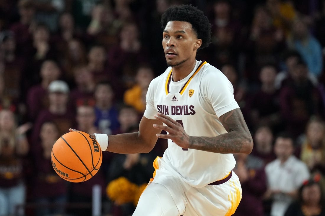 Dec 4, 2022; Tempe, Arizona, USA; Arizona State Sun Devils guard Desmond Cambridge Jr. (4) dribbles against the Stanford Cardinal during the second half at Desert Financial Arena. Mandatory Credit: Joe Camporeale-USA TODAY Sports