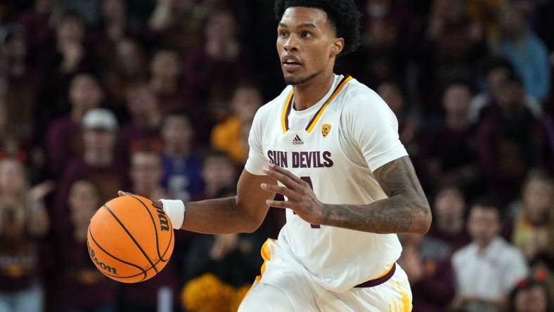 Dec 4, 2022; Tempe, Arizona, USA; Arizona State Sun Devils guard Desmond Cambridge Jr. (4) dribbles against the Stanford Cardinal during the second half at Desert Financial Arena. Mandatory Credit: Joe Camporeale-USA TODAY Sports