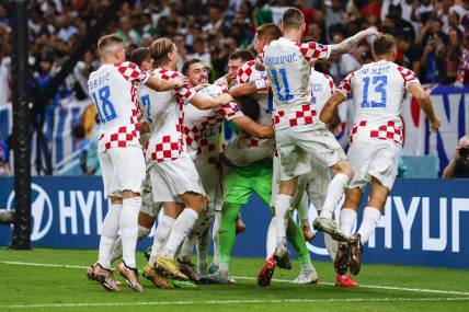 Dec 5, 2022; Al-Wakrah, Qatar; Croatia players celebrate with 3-1 victory on penalty kicks in a round of sixteen match against Japan during the 2022 FIFA World Cup at Al-Janoub Stadium. Mandatory Credit: Yukihito Taguchi-USA TODAY Sports