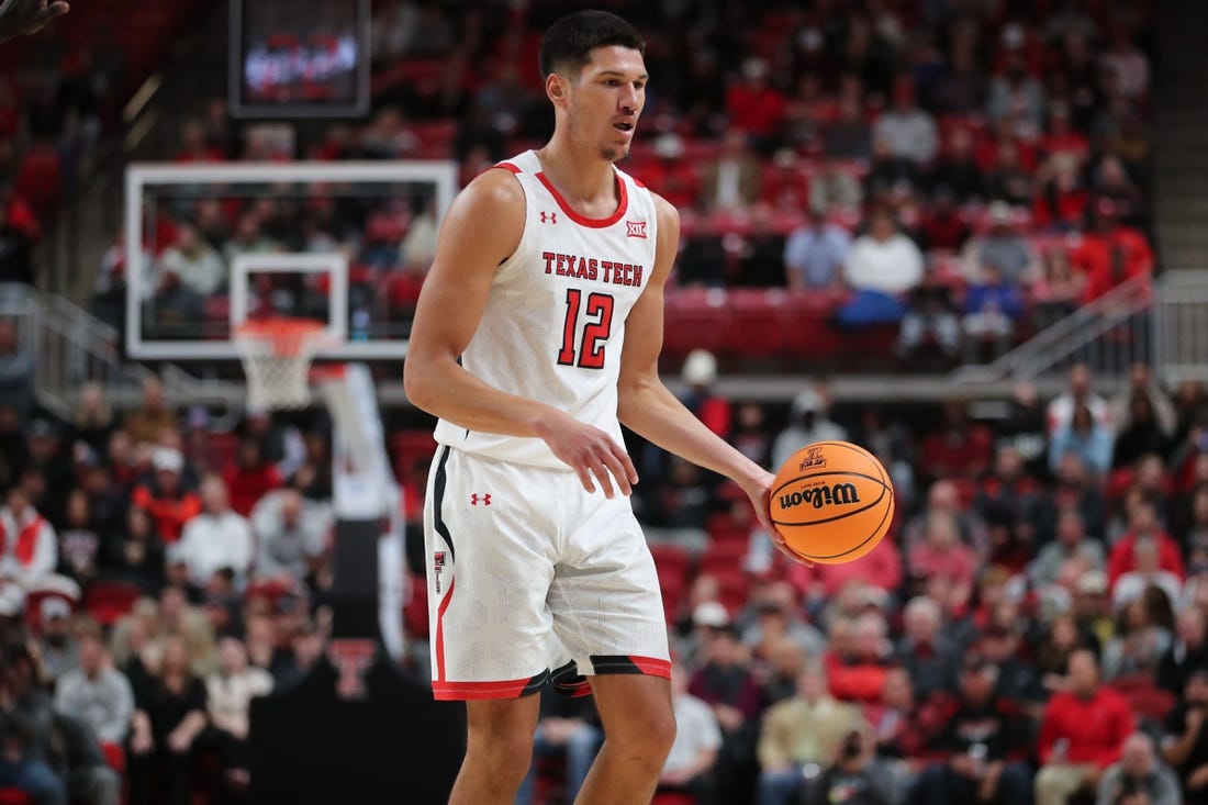 Nov 30, 2022; Lubbock, Texas, USA;  Texas Tech Red Raiders forward Daniel Batcho (12) dribbles the ball against the Georgetown Hoyas in the second half at United Supermarkets Arena. Mandatory Credit: Michael C. Johnson-USA TODAY Sports