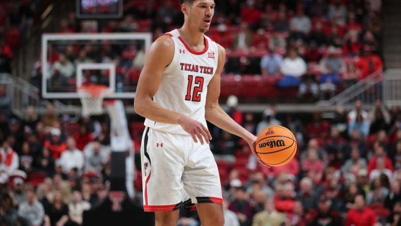 Nov 30, 2022; Lubbock, Texas, USA;  Texas Tech Red Raiders forward Daniel Batcho (12) dribbles the ball against the Georgetown Hoyas in the second half at United Supermarkets Arena. Mandatory Credit: Michael C. Johnson-USA TODAY Sports