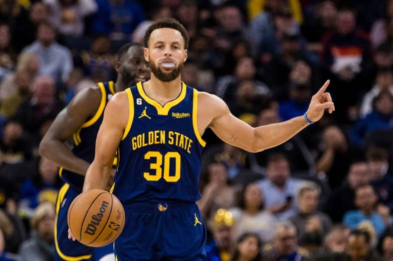 Dec 3, 2022; San Francisco, California, USA;  Golden State Warriors guard Stephen Curry (30) gestures during the second half of the game against the Houston Rockets at Chase Center. Mandatory Credit: John Hefti-USA TODAY Sports