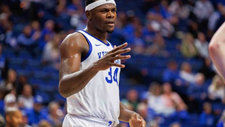 Nov 29, 2022; Lexington, Kentucky, USA; Kentucky Wildcats forward Oscar Tshiebwe (34) shakes hands with Bellarmine Knights players after the game at Rupp Arena at Central Bank Center. Mandatory Credit: Jordan Prather-USA TODAY Sports