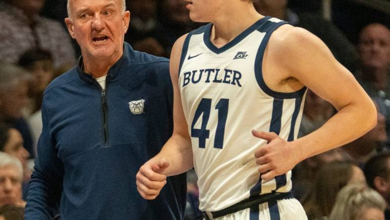 Butler Bulldogs head coach Thad Matta chats with Butler Bulldogs guard Simas Lukosius (41) at Hinkle Fieldhouse, Tuesday, Dec. 6, 2022, as Yale loses to the Butler men, 61-71.