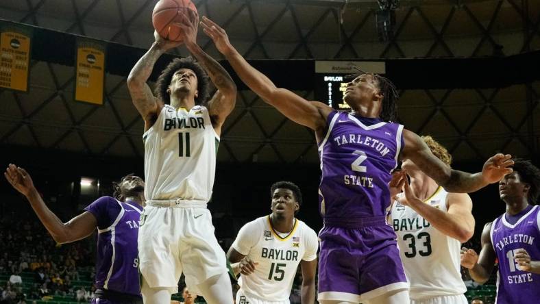 Dec 6, 2022; Waco, Texas, USA;  Baylor Bears forward Jalen Bridges (11) looks to score against Tarleton Texans guard Freddy Hicks (2) during the first half at Ferrell Center. Mandatory Credit: Chris Jones-USA TODAY Sports