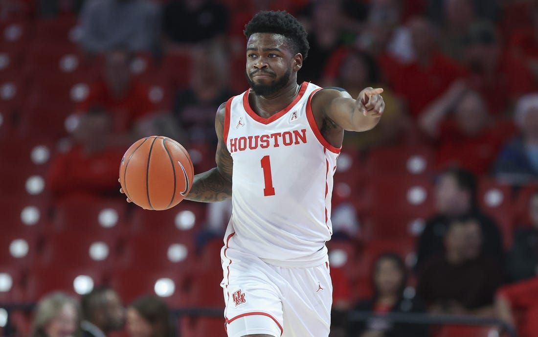 Dec 6, 2022; Houston, Texas, USA; Houston Cougars guard Jamal Shead (1) dribbles the ball during the first half against the North Florida Ospreys at Fertitta Center. Mandatory Credit: Troy Taormina-USA TODAY Sports