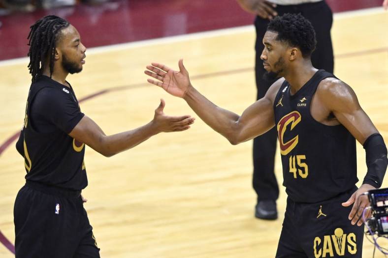 Dec 6, 2022; Cleveland, Ohio, USA; Cleveland Cavaliers guard Darius Garland (10) and guard Donovan Mitchell (45) celebrate in the fourth quarter against the Los Angeles Lakers at Rocket Mortgage FieldHouse. Mandatory Credit: David Richard-USA TODAY Sports