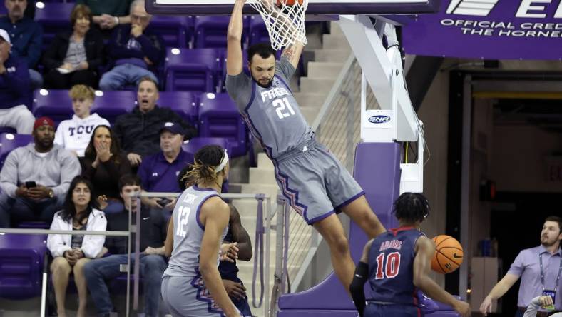 Dec 6, 2022; Fort Worth, Texas, USA;  TCU Horned Frogs forward JaKobe Coles (21) dunks during the second half against the Jackson State Tigers at Ed and Rae Schollmaier Arena. Mandatory Credit: Kevin Jairaj-USA TODAY Sports