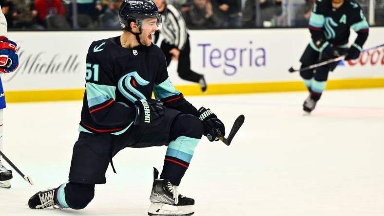 Dec 6, 2022; Seattle, Washington, USA; Seattle Kraken center Shane Wright (51) celebrates scoring his first NHL career goal against the Montreal Canadiens during the first period at Climate Pledge Arena. Mandatory Credit: Steven Bisig-USA TODAY Sports