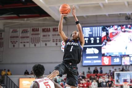 Dec 7, 2022; Queens, New York, USA; DePaul Blue Demons forward Javan Johnson (1) takes a three point shot in the first half against the St. John's Red Storm at Carnesecca Arena. Mandatory Credit: Wendell Cruz-USA TODAY Sports