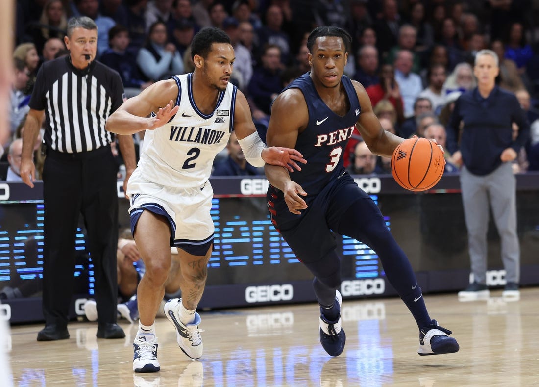 Dec 7, 2022; Villanova, Pennsylvania, USA; Pennsylvania Quakers guard Jordan Dingle (3) dribbles against Villanova Wildcats guard Mark Armstrong (2) during the first half at William B. Finneran Pavilion. Mandatory Credit: Bill Streicher-USA TODAY Sports