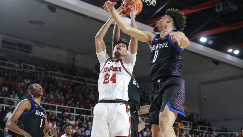 Dec 7, 2022; Queens, New York, USA; St. John's Red Storm guard Rafael Pinzon (24) shoots over DePaul Blue Demons guard Zion Cruz (0) in the second half at Carnesecca Arena. Mandatory Credit: Wendell Cruz-USA TODAY Sports