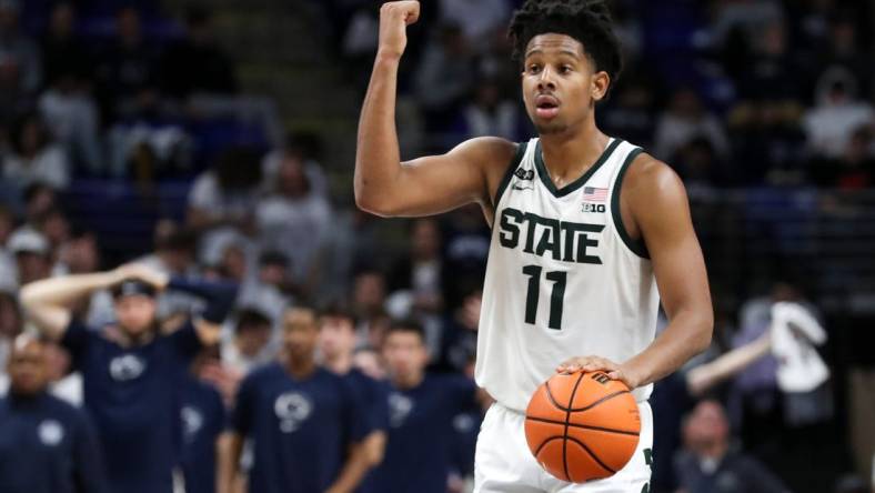 Dec 7, 2022; University Park, Pennsylvania, USA; Michigan State Spartans guard AJ Hoggard (11) gestures from mid court during the second half against the Penn State Nittany Lions at Bryce Jordan Center. Michigan State defeated Penn State 67-58. Mandatory Credit: Matthew OHaren-USA TODAY Sports