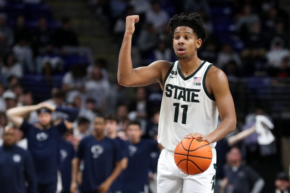 Dec 7, 2022; University Park, Pennsylvania, USA; Michigan State Spartans guard AJ Hoggard (11) gestures from mid court during the second half against the Penn State Nittany Lions at Bryce Jordan Center. Michigan State defeated Penn State 67-58. Mandatory Credit: Matthew OHaren-USA TODAY Sports