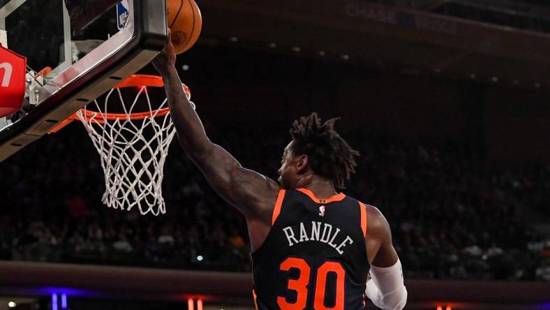 Dec 7, 2022; New York, New York, USA;  New York Knicks forward Julius Randle (30) attempts a lay up against the Atlanta Hawks during the third quarter  at Madison Square Garden. Mandatory Credit: Dennis Schneidler-USA TODAY Sports