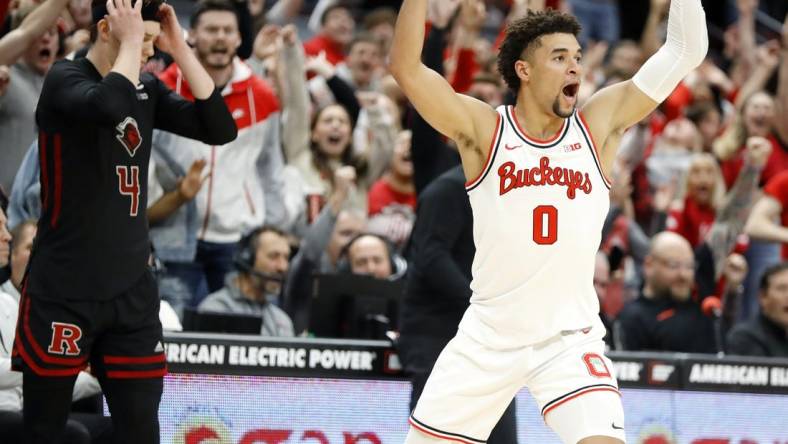 Dec 8, 2022; Columbus, Ohio, USA; Ohio State Buckeyes guard Tanner Holden (0) celebrates after making the game winning three-point shot as time ran out against the Rutgers Scarlet Knights at Value City Arena. Mandatory Credit: Joseph Maiorana-USA TODAY Sports