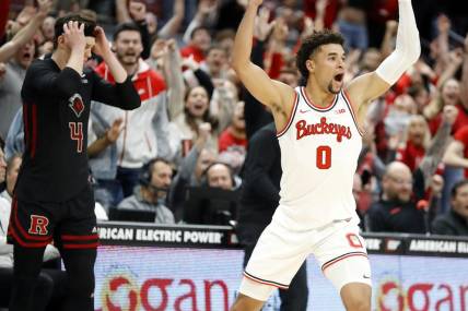 Dec 8, 2022; Columbus, Ohio, USA; Ohio State Buckeyes guard Tanner Holden (0) celebrates after making the game winning three-point shot as time ran out against the Rutgers Scarlet Knights at Value City Arena. Mandatory Credit: Joseph Maiorana-USA TODAY Sports