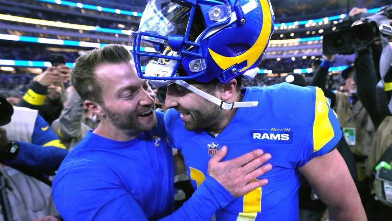 Dec 8, 2022; Inglewood, California, USA; Los Angeles Rams coach Sean McVay (left) and quarterback Baker Mayfield (17) celebrate after the game against the Las Vegas Raiders at SoFi Stadium. Mandatory Credit: Kirby Lee-USA TODAY Sports