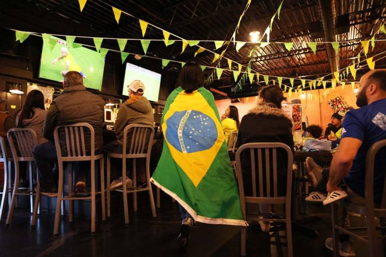 Brazilian soccer fans react at a World Cup viewing party at Brazil Grill in Brockton, in the quarterfinal round versus Croatia, which resulted in a 1-1 win for Croatia on penalty kicks, on Friday, Dec. 9, 20222.

World Cup