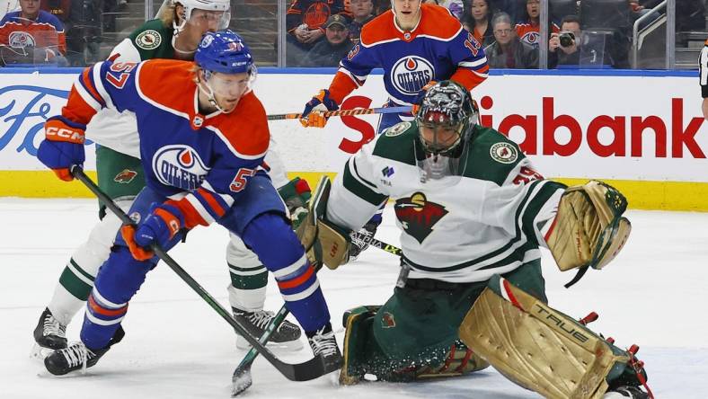 Dec 9, 2022; Edmonton, Alberta, CAN; Minnesota Wild goaltender Marc-Andre Fleury (29) makes a save on a shot by Edmonton Oilers forward James Hamblin (57)  during the first period at Rogers Place. Mandatory Credit: Perry Nelson-USA TODAY Sports