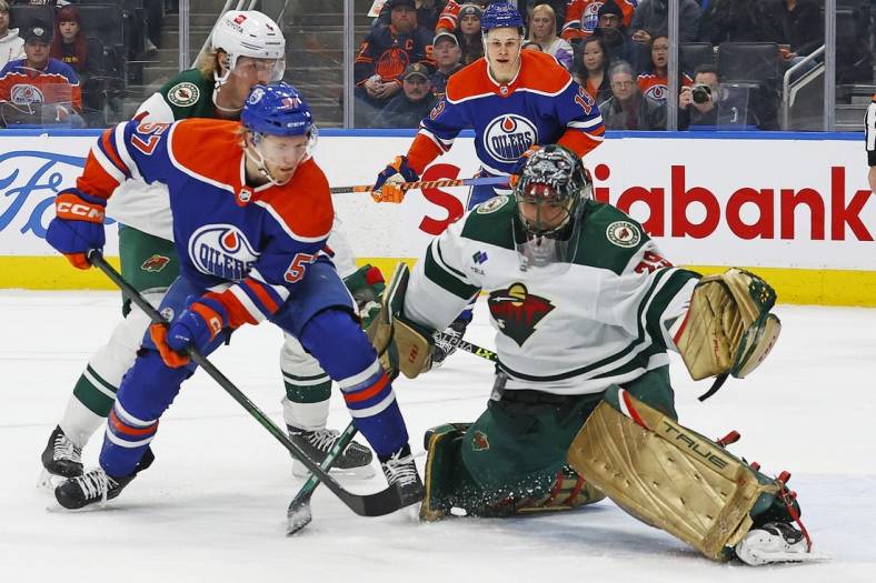 Dec 9, 2022; Edmonton, Alberta, CAN; Minnesota Wild goaltender Marc-Andre Fleury (29) makes a save on a shot by Edmonton Oilers forward James Hamblin (57)  during the first period at Rogers Place. Mandatory Credit: Perry Nelson-USA TODAY Sports