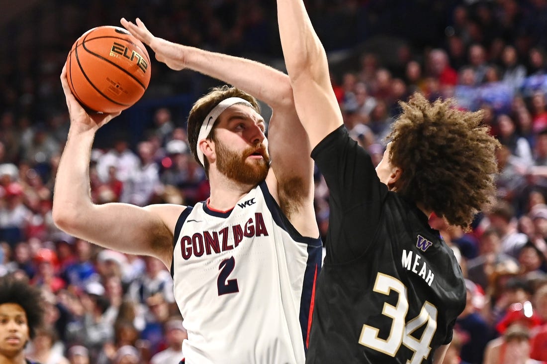 Dec 9, 2022; Spokane, Washington, USA; Gonzaga Bulldogs forward Drew Timme (2) shoots the ball against Washington Huskies center Braxton Meah (34) in the second half at McCarthey Athletic Center. Gonzaga won 77-60. Mandatory Credit: James Snook-USA TODAY Sports