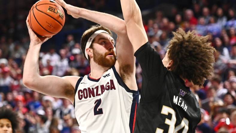 Dec 9, 2022; Spokane, Washington, USA; Gonzaga Bulldogs forward Drew Timme (2) shoots the ball against Washington Huskies center Braxton Meah (34) in the second half at McCarthey Athletic Center. Gonzaga won 77-60. Mandatory Credit: James Snook-USA TODAY Sports