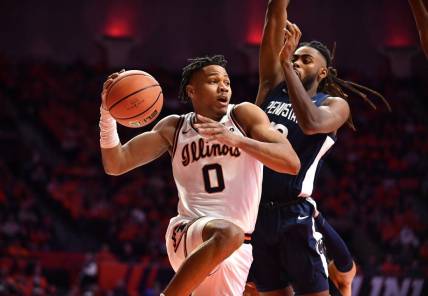 Dec 10, 2022; Champaign, Illinois, USA;  Illinois Fighting Illini guard Terrence Shannon Jr. (0) moves to the basket during the first half against the Penn State Nittany Lions at State Farm Center. Mandatory Credit: Ron Johnson-USA TODAY Sports