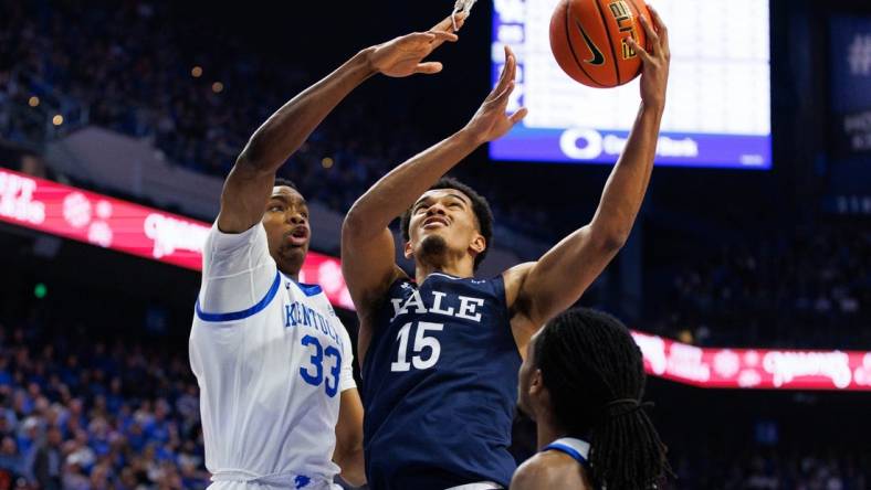 Dec 10, 2022; Lexington, Kentucky, USA; Yale Bulldogs forward EJ Jarvis (15) goes to the basket during the first half against the Kentucky Wildcats at Rupp Arena at Central Bank Center. Mandatory Credit: Jordan Prather-USA TODAY Sports