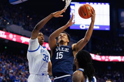 Dec 10, 2022; Lexington, Kentucky, USA; Yale Bulldogs forward EJ Jarvis (15) goes to the basket during the first half against the Kentucky Wildcats at Rupp Arena at Central Bank Center. Mandatory Credit: Jordan Prather-USA TODAY Sports