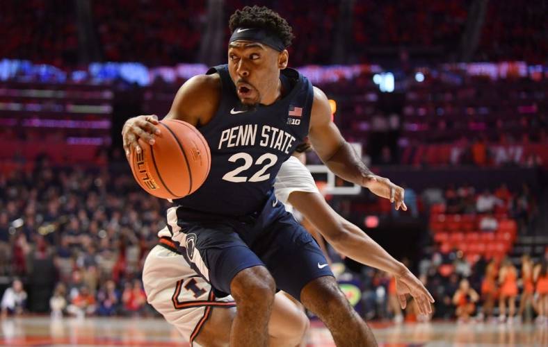 Dec 10, 2022; Champaign, Illinois, USA;  Penn State Nittany Lions guard Jalen Pickett (22) moves the ball to the basket during the second half against the Illinois Fighting Illini at State Farm Center. Mandatory Credit: Ron Johnson-USA TODAY Sports
