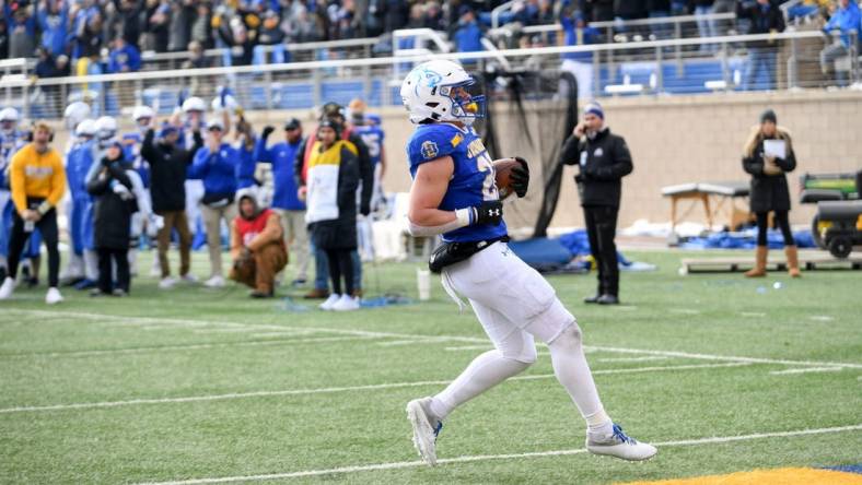 South Dakota State   s Isaiah Davis runs the ball in for a two-point conversion while playing Holy Cross in the FCS quarterfinals on Saturday, December 10, 2022, in Sioux Falls.

Fcs Quarterfinal 016