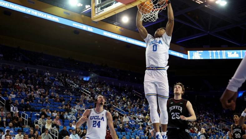 Dec 10, 2022; Los Angeles, California, USA;  UCLA Bruins guard Jaylen Clark (0) dunks the ball during the first half against the Denver Pioneers at Pauley Pavilion presented by Wescom. Mandatory Credit: Kiyoshi Mio-USA TODAY Sports