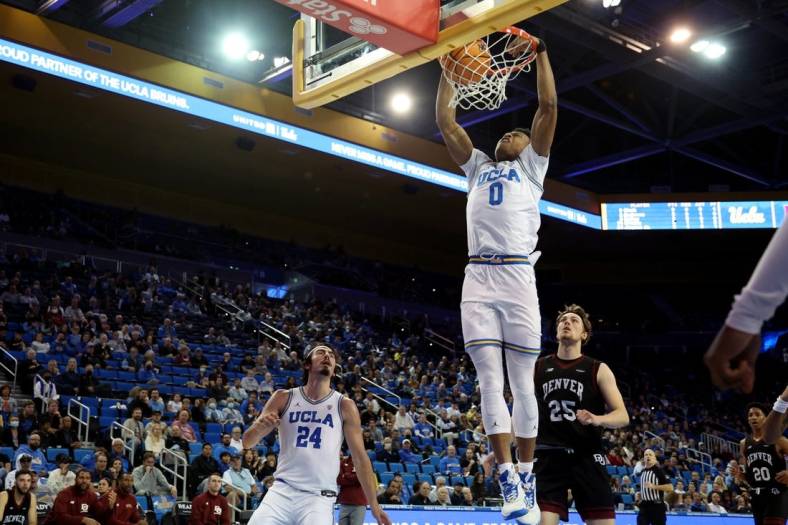 Dec 10, 2022; Los Angeles, California, USA;  UCLA Bruins guard Jaylen Clark (0) dunks the ball during the first half against the Denver Pioneers at Pauley Pavilion presented by Wescom. Mandatory Credit: Kiyoshi Mio-USA TODAY Sports