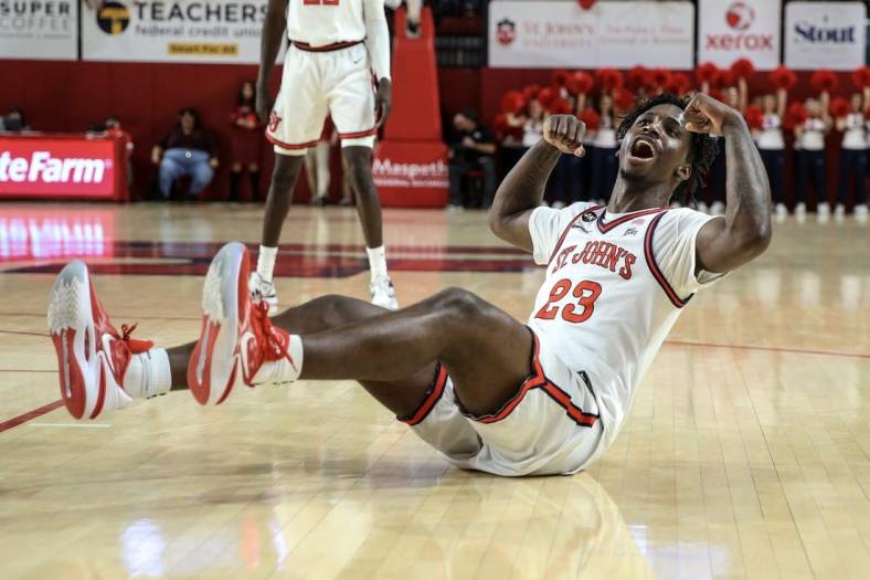Dec 10, 2022; Queens, New York, USA;  St. John's Red Storm forward David Jones (23) celebrates after scoring against the New Hampshire Wildcats in the second half at Carnesecca Arena. Mandatory Credit: Wendell Cruz-USA TODAY Sports