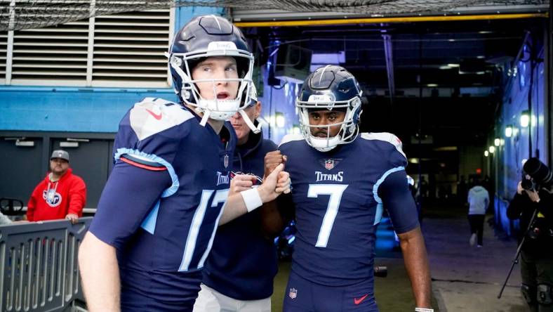 Dec 11, 2022; Nashville, Tennessee, USA; Tennessee Titans quarterbacks Ryan Tannehill (17) and Malik Willis (7) head to the field as the team gets ready to face the Jacksonville Jaguars at Nissan Stadium. Mandatory Credit: George Walker IV/The Tennessean-USA TODAY Sports