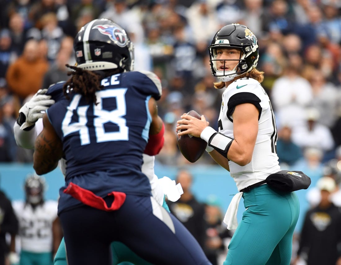 Dec 11, 2022; Nashville, Tennessee, USA; Jacksonville Jaguars quarterback Trevor Lawrence (16) drops back to pass during the first half against the Tennessee Titans at Nissan Stadium. Mandatory Credit: Christopher Hanewinckel-USA TODAY Sports