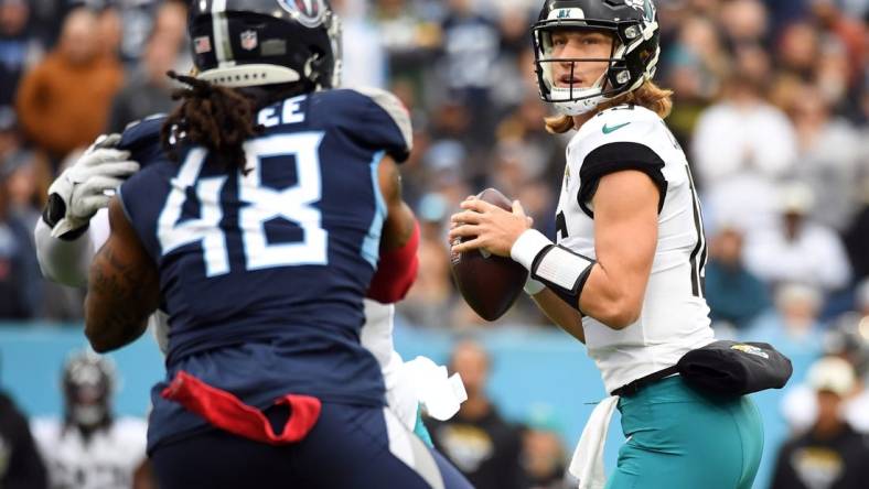 Dec 11, 2022; Nashville, Tennessee, USA; Jacksonville Jaguars quarterback Trevor Lawrence (16) drops back to pass during the first half against the Tennessee Titans at Nissan Stadium. Mandatory Credit: Christopher Hanewinckel-USA TODAY Sports