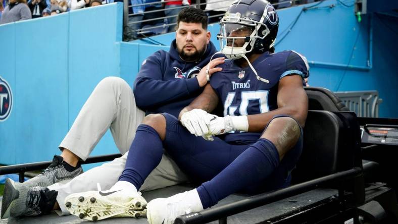 Tennessee Titans running back Dontrell Hilliard (40) is carted off the field after an injury during the second quarter at Nissan Stadium Sunday, Dec. 11, 2022, in Nashville, Tenn.

Nfl Jacksonville Jaguars At Tennessee Titans