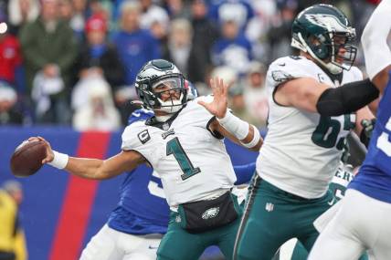 Dec 11, 2022; East Rutherford, New Jersey, USA; Philadelphia Eagles quarterback Jalen Hurts (1) throws the ball during the first half against the New York Giants at MetLife Stadium. Mandatory Credit: Vincent Carchietta-USA TODAY Sports