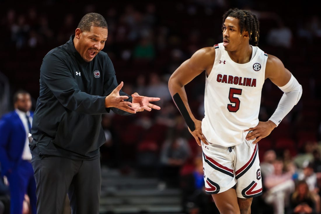 Dec 11, 2022; Columbia, South Carolina, USA; South Carolina Gamecocks head coach Lamont Paris directs South Carolina Gamecocks guard Meechie Johnson (5) against the Presbyterian Blue Hose in the second half at Colonial Life Arena. Mandatory Credit: Jeff Blake-USA TODAY Sports