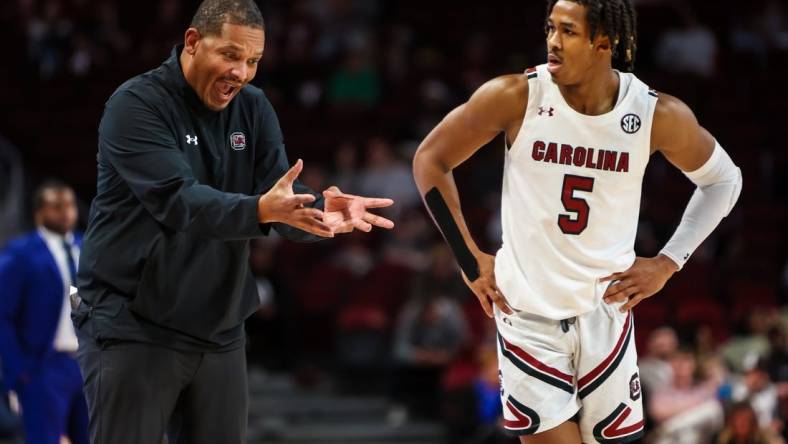 Dec 11, 2022; Columbia, South Carolina, USA; South Carolina Gamecocks head coach Lamont Paris directs South Carolina Gamecocks guard Meechie Johnson (5) against the Presbyterian Blue Hose in the second half at Colonial Life Arena. Mandatory Credit: Jeff Blake-USA TODAY Sports