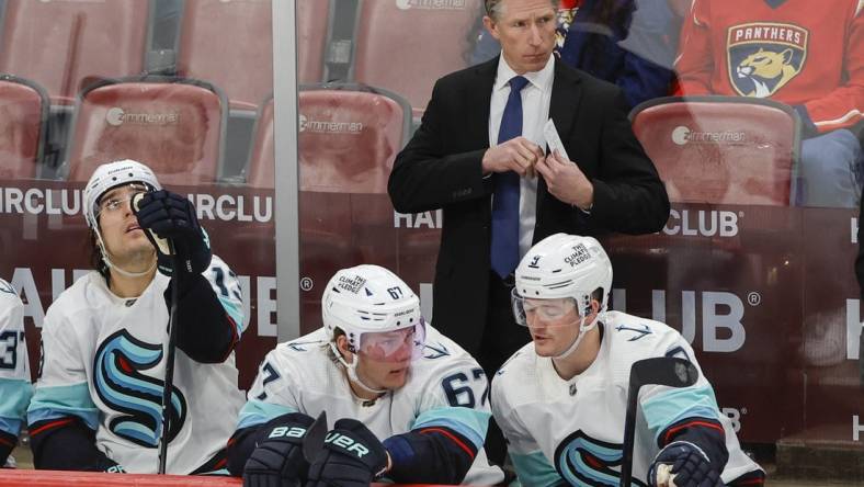 Dec 11, 2022; Sunrise, Florida, USA; Seattle Kraken head coach Dave Hakstol looks on from the bench during the third period against the Florida Panthers  at FLA Live Arena. Mandatory Credit: Sam Navarro-USA TODAY Sports